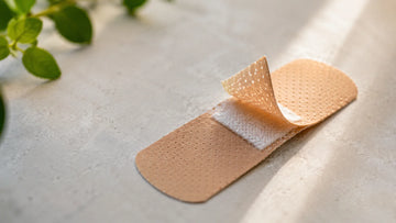 How to remove an adhesive bandage
